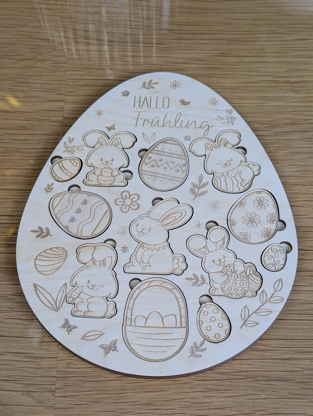 Montessori-Holzpuzzle „Hasenbande“