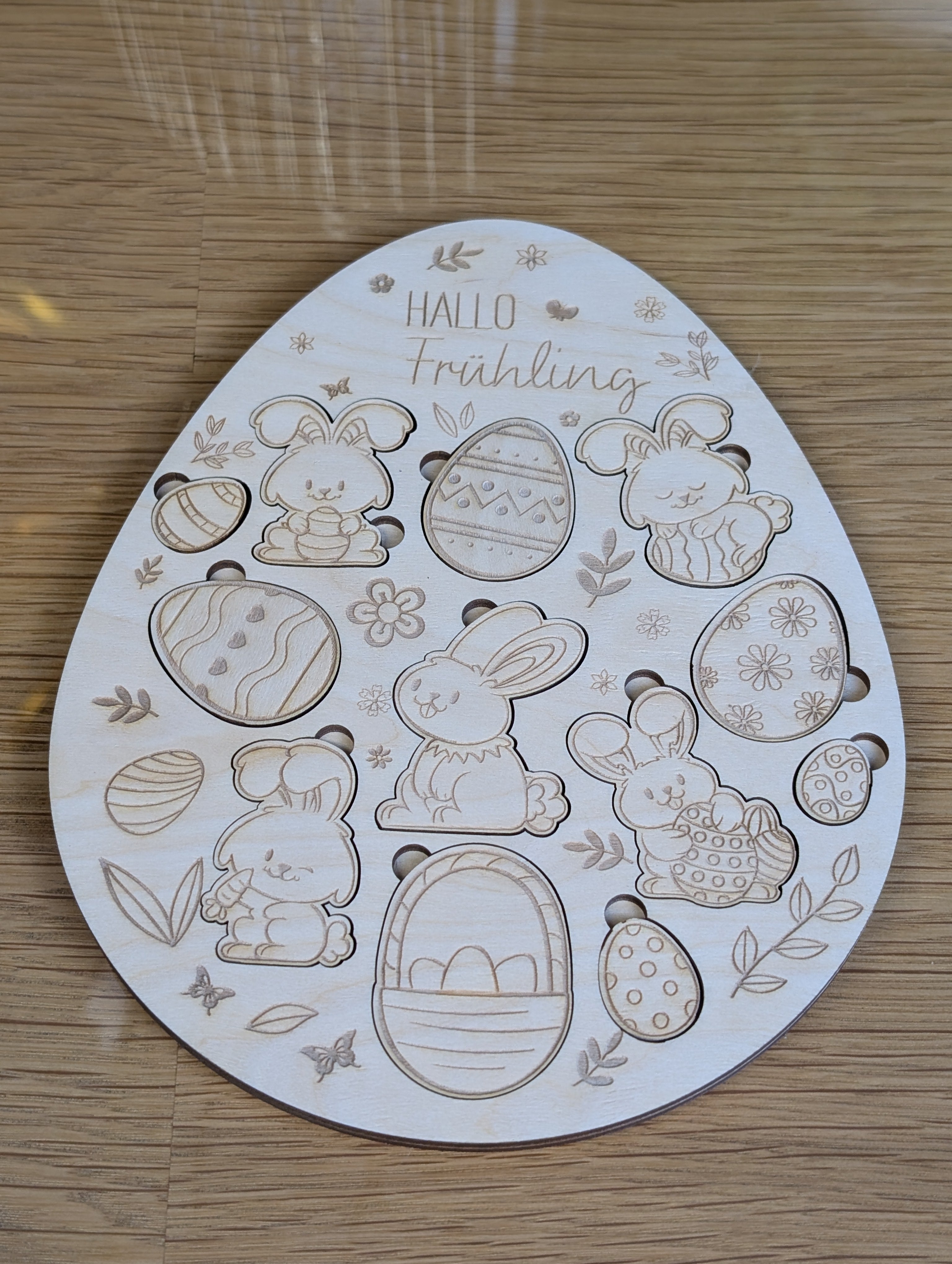 Montessori-Holzpuzzle „Hasenbande“